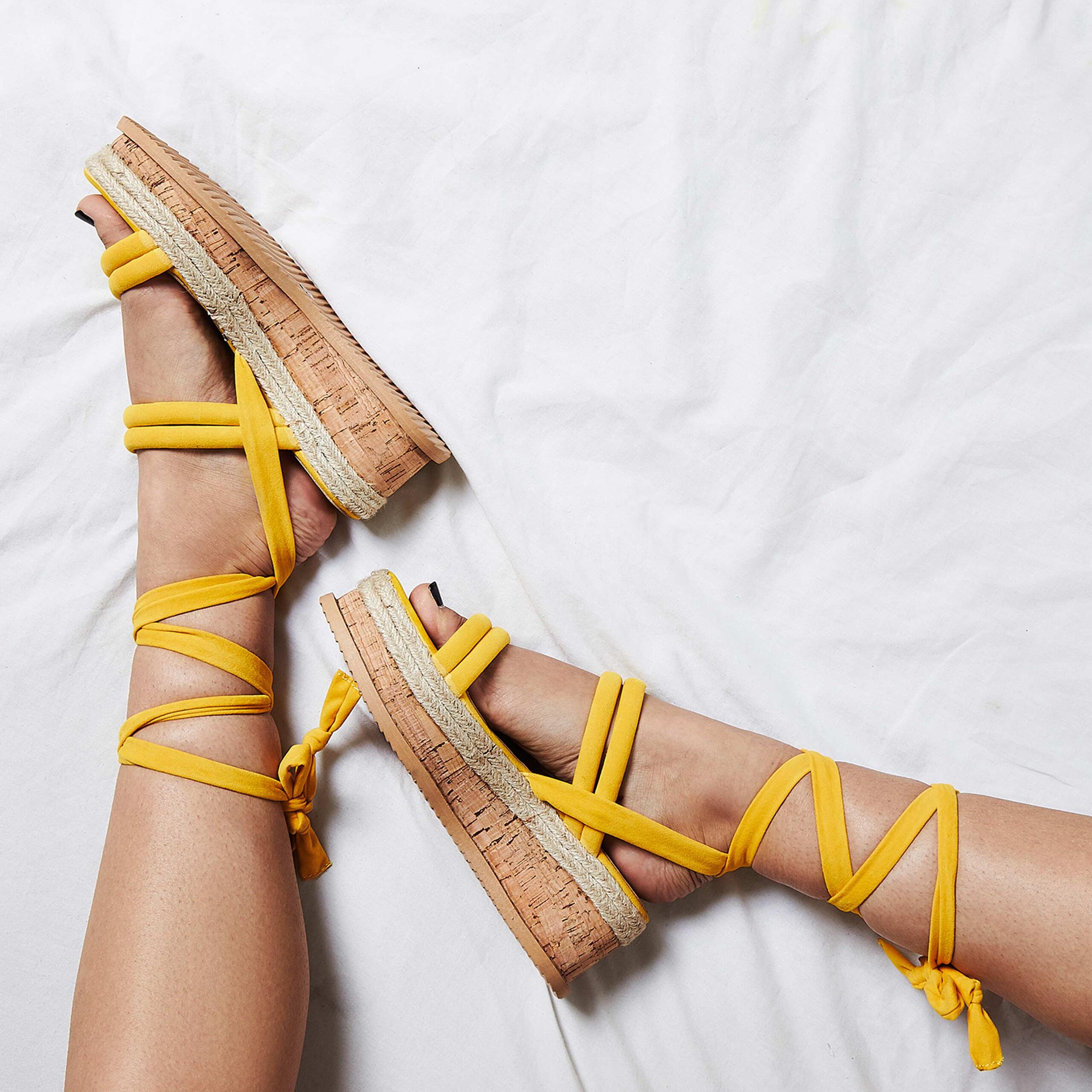 An image of a pair of summer shoes which are the Whisper lace up espadrille