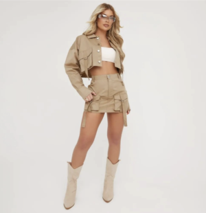 blonde lady wearing a two piece cargo set with skirt and jacket