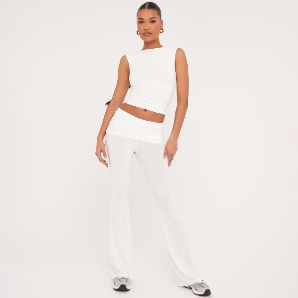 High Neck Sleeveless Top And Low Rise Fold Over Flared Trousers Co-Ord Set In White Slinky, Women’s Size UK 8