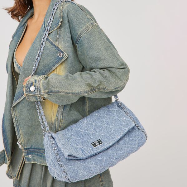 Vossy Chain Strap Detail Fold Over Shoulder Bag In Light Blue Quilted Denim