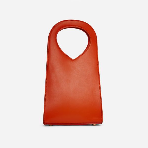 Itzel Top Handle Shaped Grab Bag In Orange Faux Leather