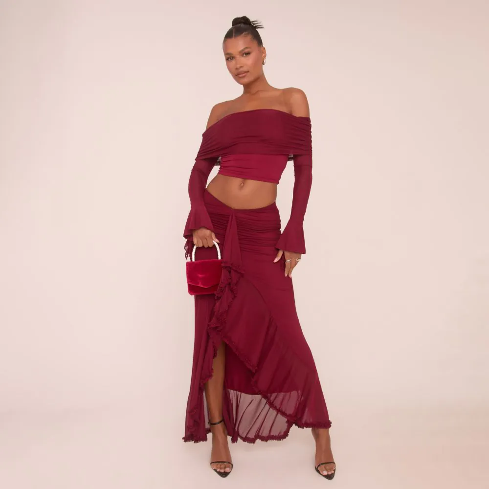 Long Flared Sleeve Fold Over Bardot Top And Dipped Waist Frill Detail Maxi Skirt Co Ord Set In Burgundy Mesh EGO